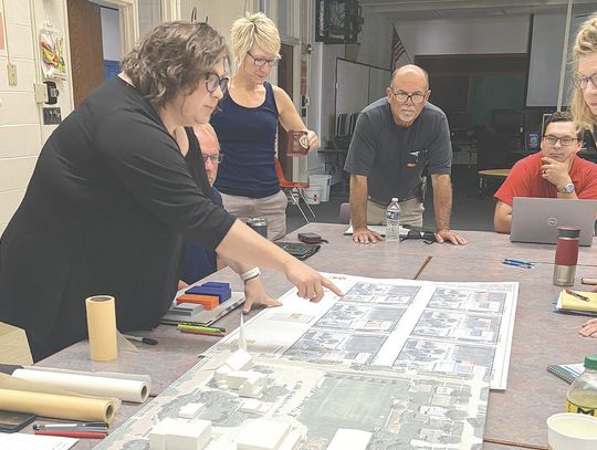 Building committee hires construction mgr.