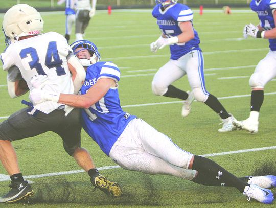 Defenders work OT to top Wynot 36-30