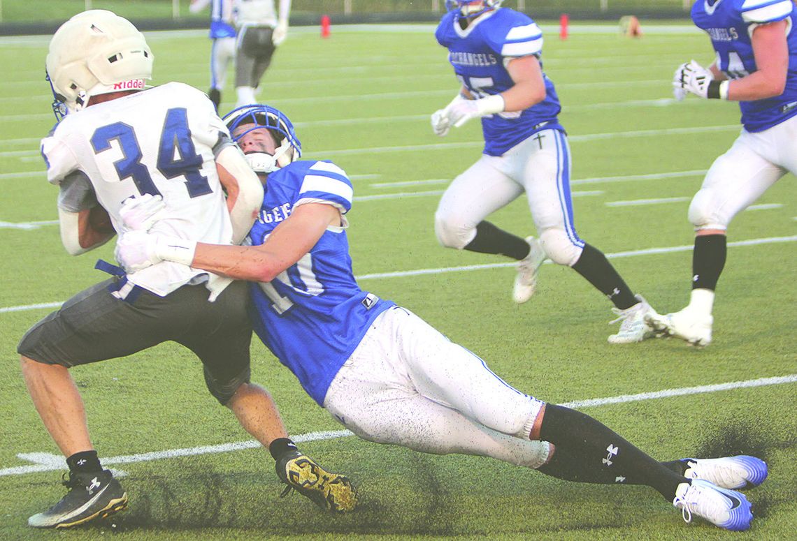 Defenders work OT to top Wynot 36-30