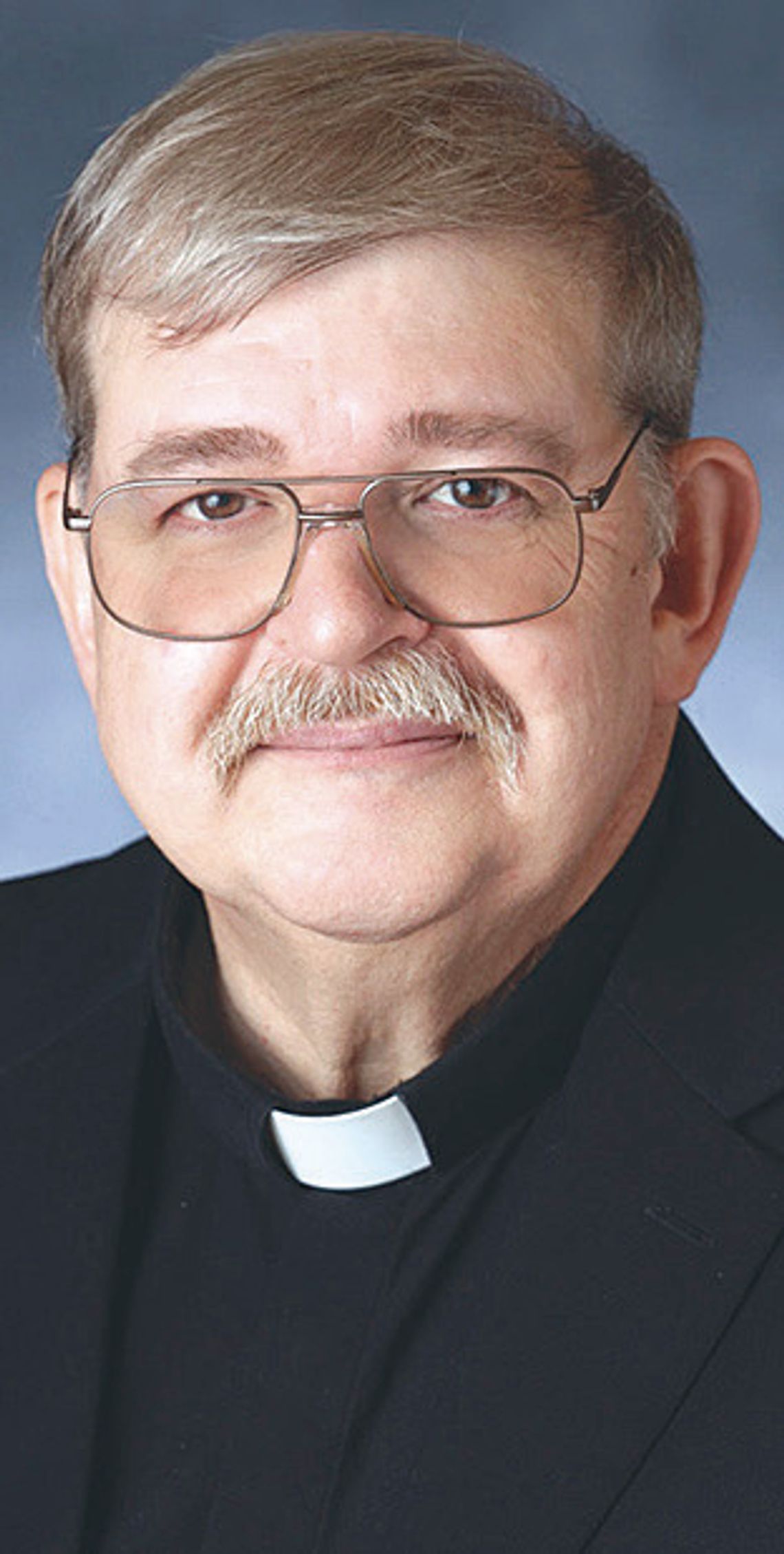 Father Schmit guides in tough times